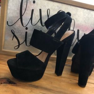Steve Madden black platform heels.